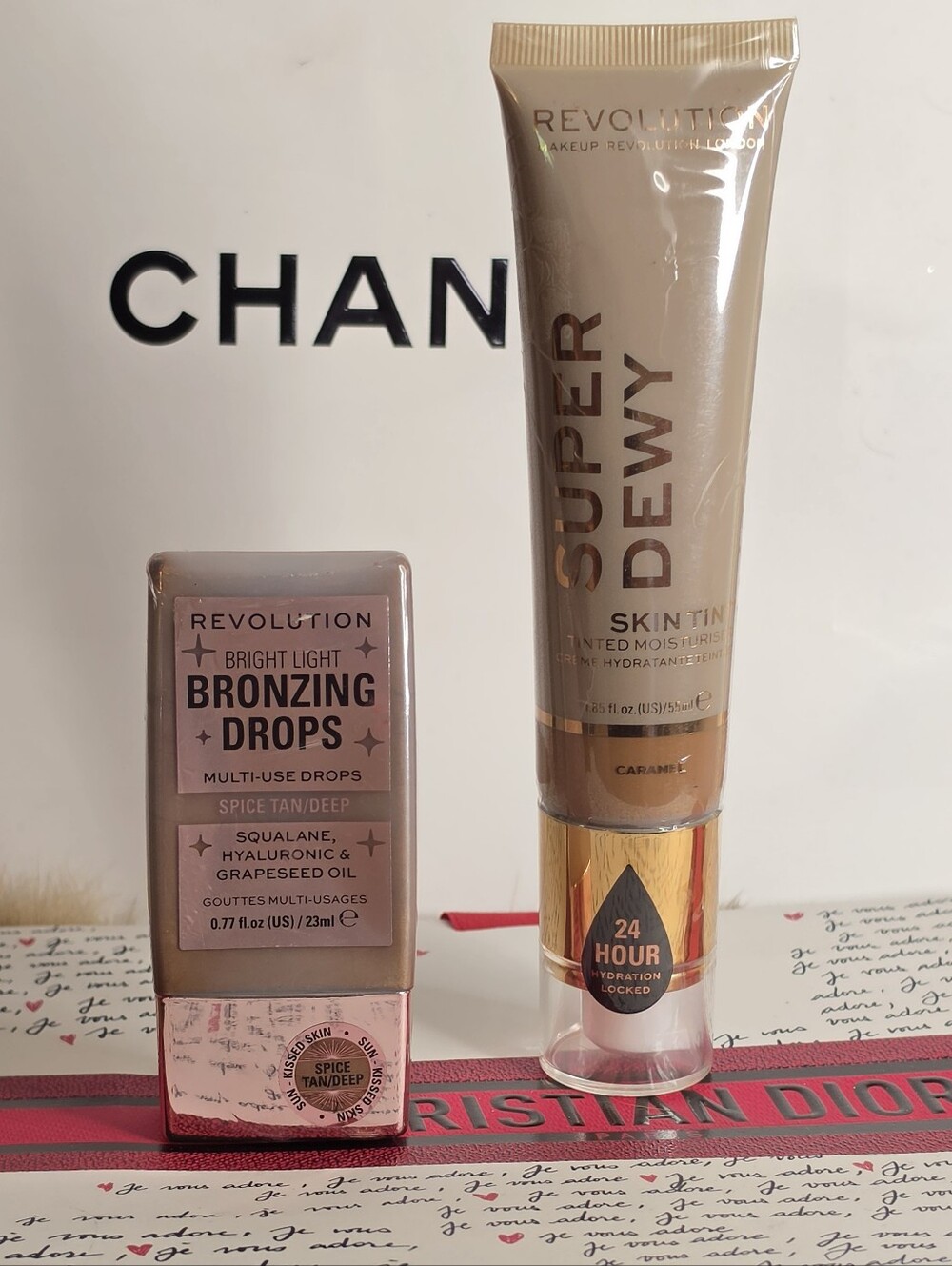 Revolution Skin Tint Moisturiser Caramel Color ,and Revolution Bronzing Spice T